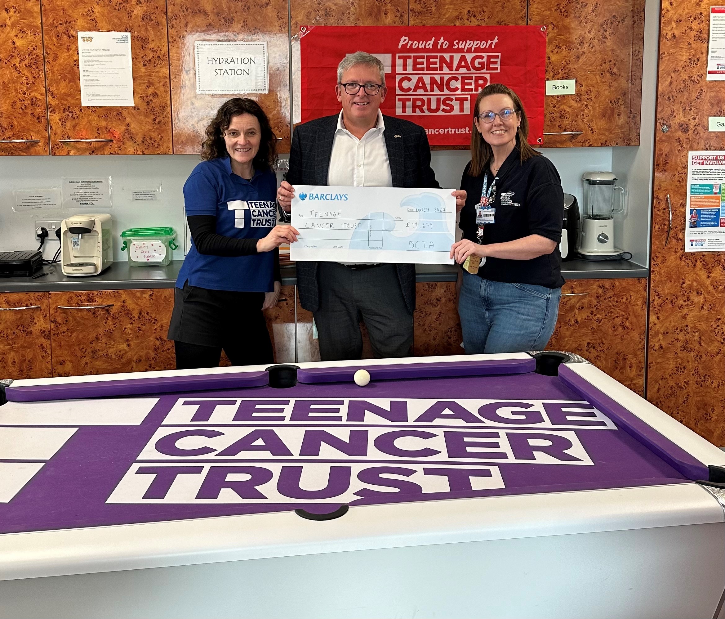 BCIA Immediate Past-President hands over charity cheque to Teenage Cancer Trust