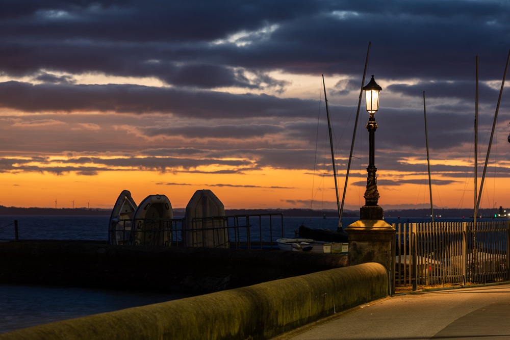 Historic seawall lights are enhanced with modern efficiency delivering over 50 percent energy savings